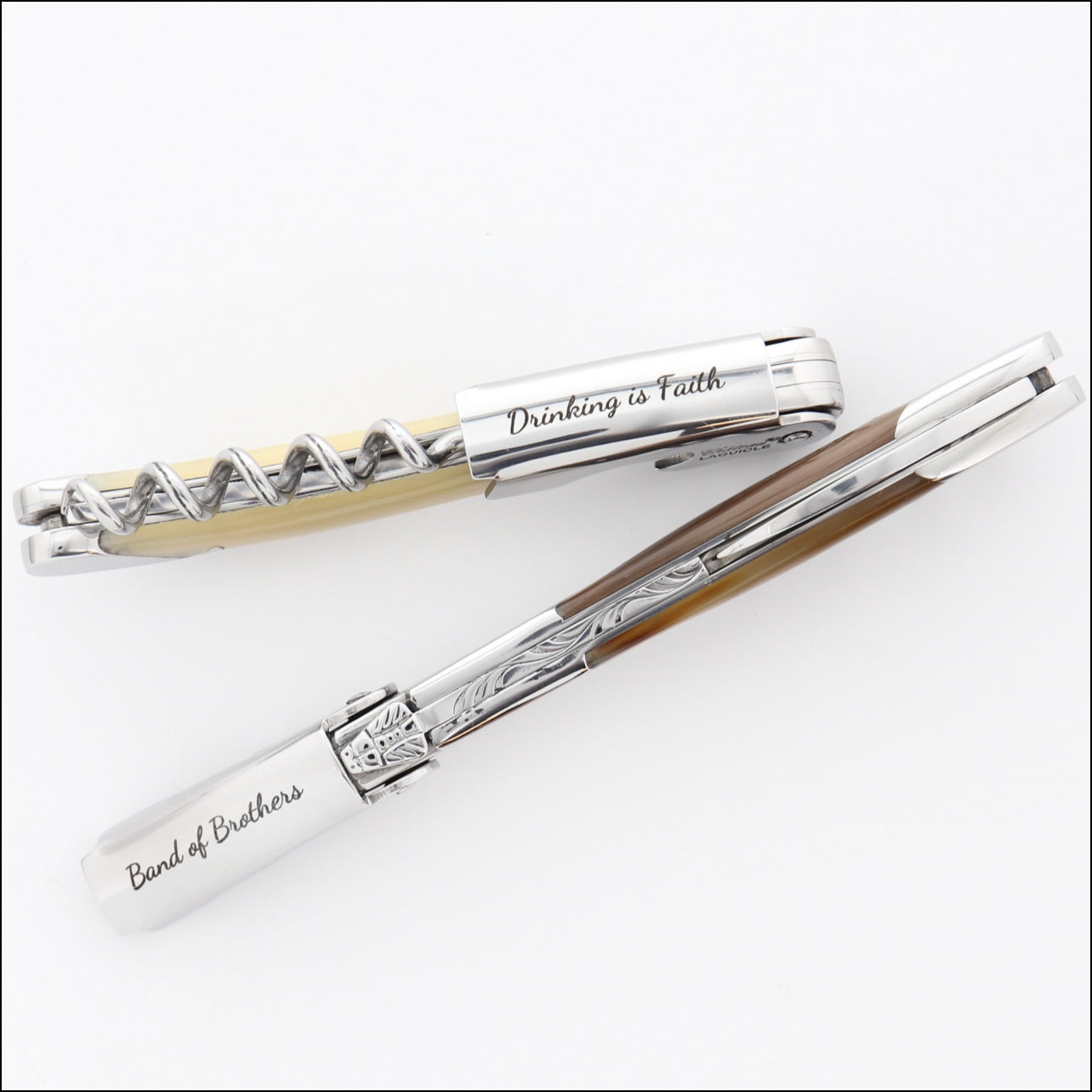 2 chateau laguiole each with one line engraving in dancing font