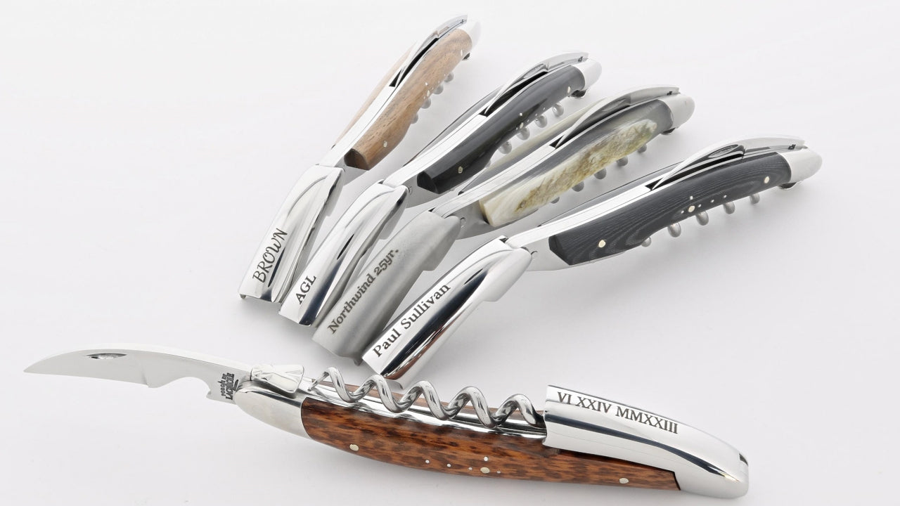 five forge de laguiole corkscrews engraved.