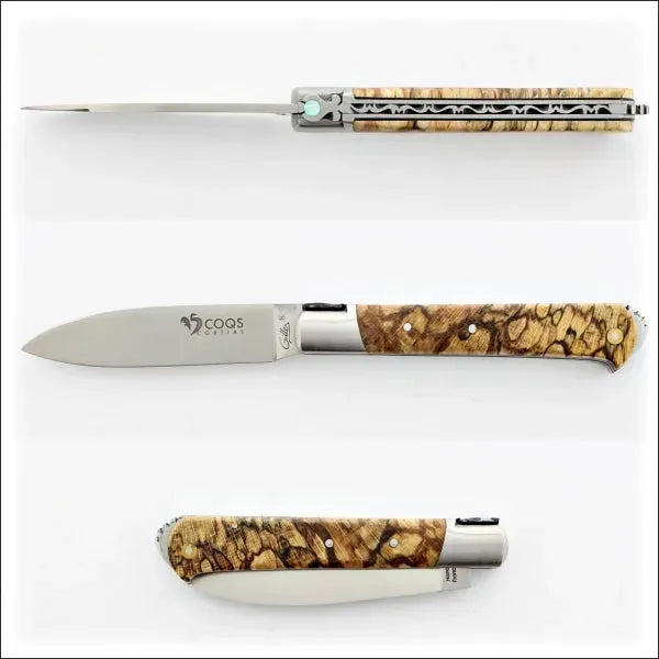 a vew of 3 5 coqs pocket knife in open position. 