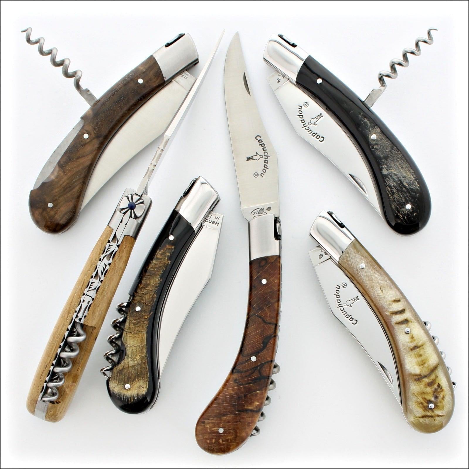 6 Capuchadou 12 cm Corkscrew Knives with in a variety of handle material such as ram horn, oak barrel and walnut