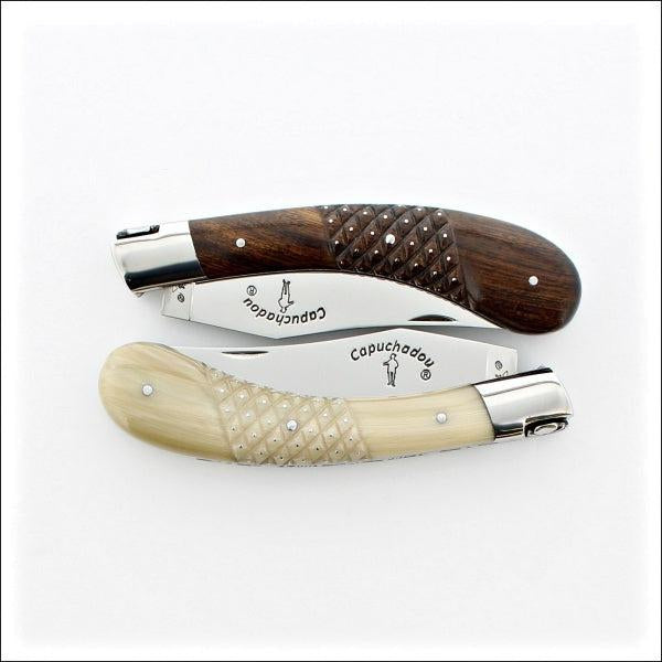 2 Capuchadou 12 cm Corkscrew knife with Studded Handles. one handle is ironwood the other in light horn tip