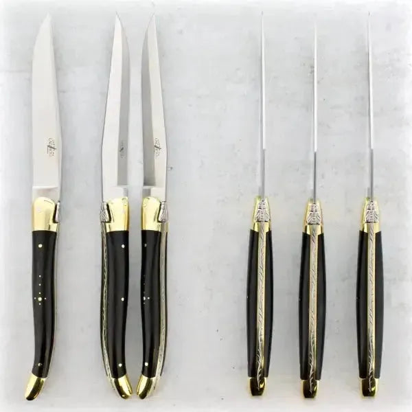 a set of 6 laguiole steak knives with brass bolster made by forge de laguiole