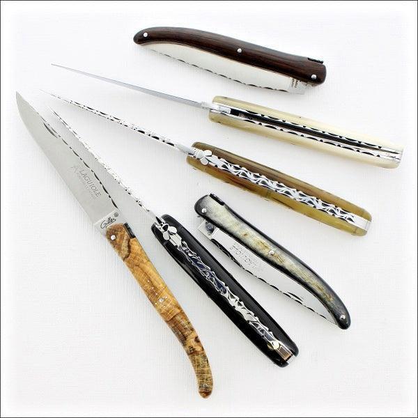 Laguiole Full Handle 11 cm Guilloche pocket knives in hand for size perception