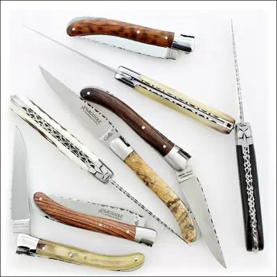 above view of several laguiole knives place at different angles