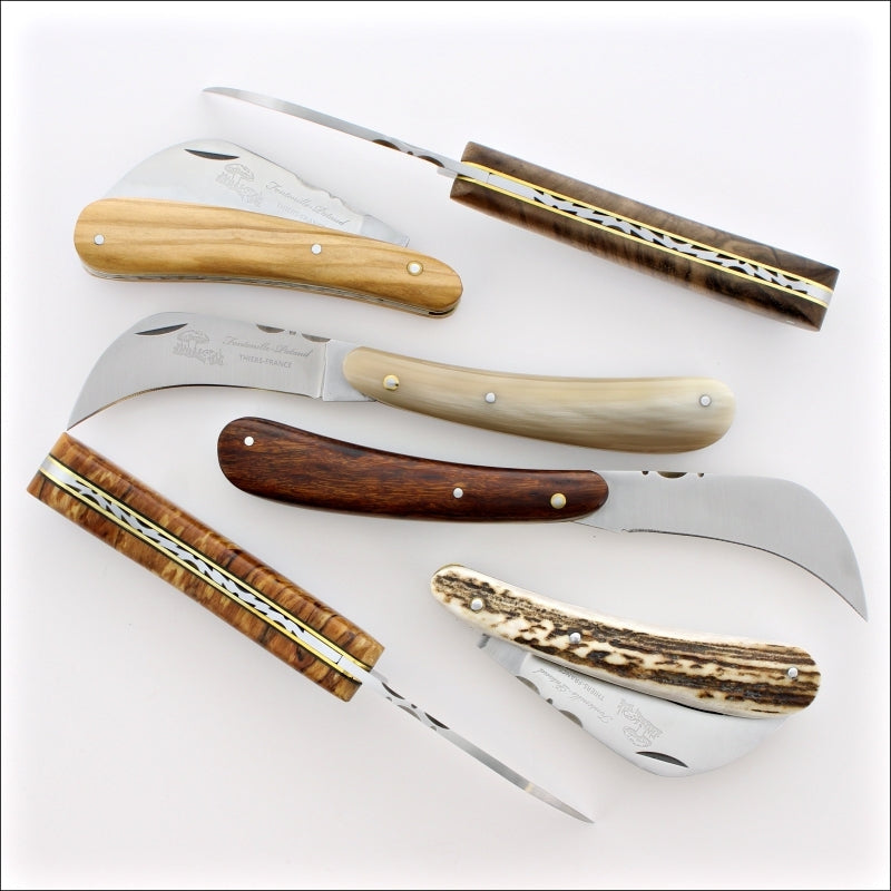 Several Mushroom - Garden Knives placed on a white background in open and close positions