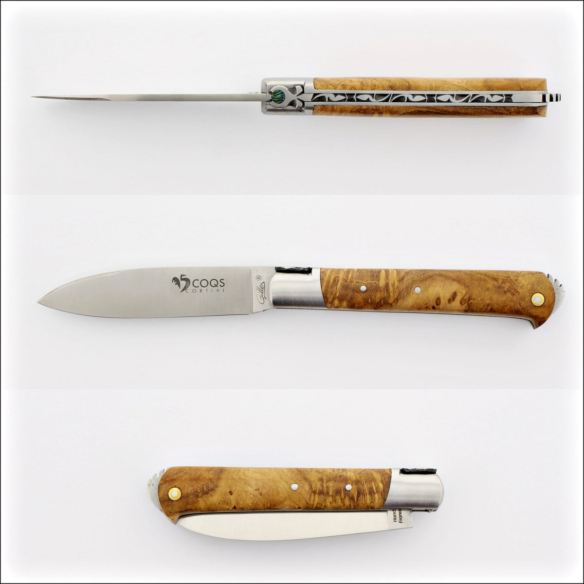 5 Coqs Pocket Knife, top-down view of open blade and maple burl handle with mother of pearl inlay. Handcrafted details, 100% Made in France.