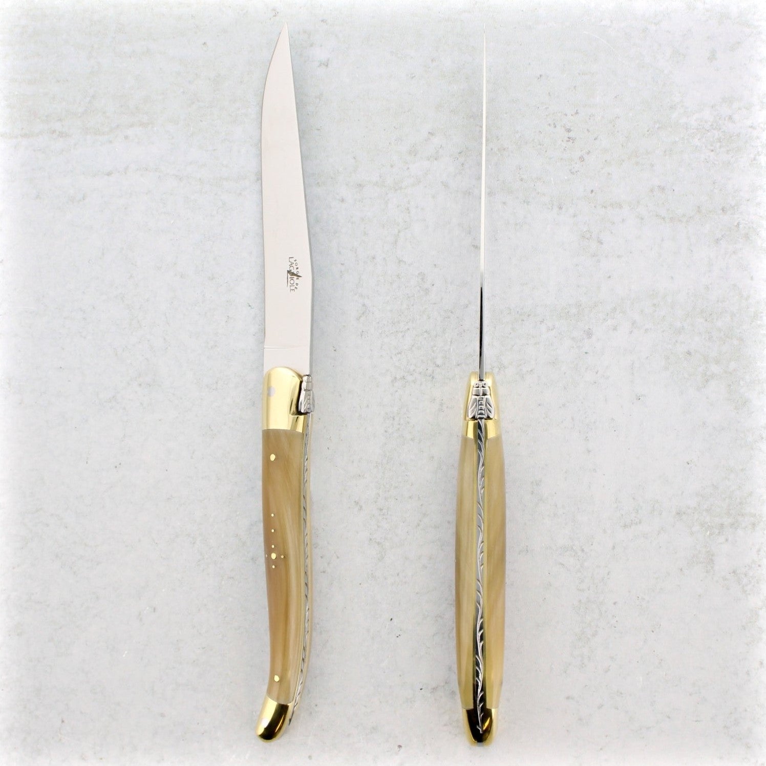 Forge de Laguiole Horn Tip Handle Steak Knives - Brass Bolsters