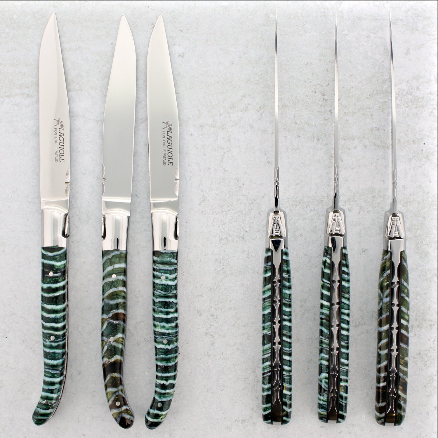 https://www.laguiole-imports.com/cdn/shop/files/Laguiole-Forged-Steak-Knives-Fossilized-Woolly-Mammoth-Tooth-Set-of-6-Emerald-Fontenille-Pataud-2.jpg?v=1703154726