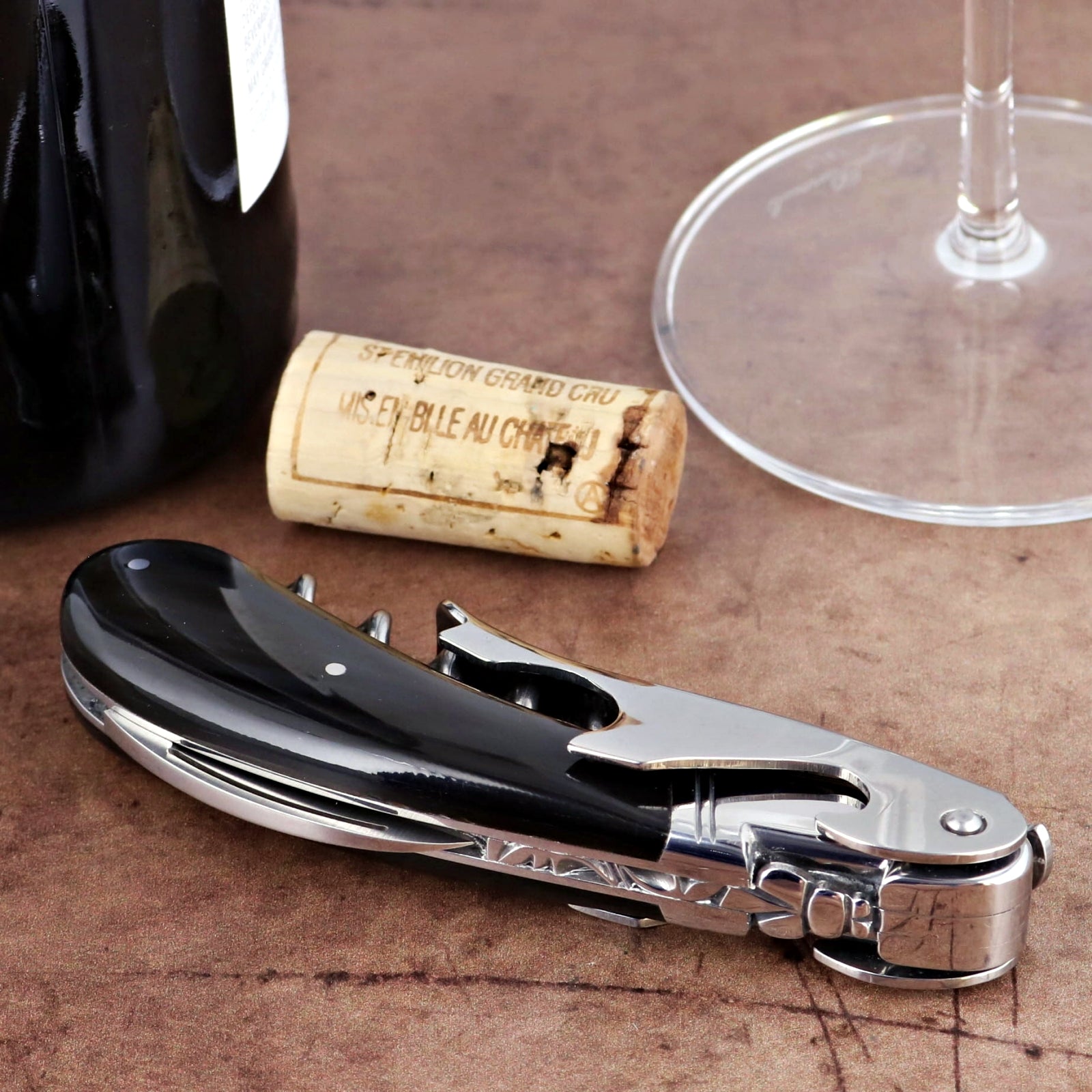 Laguiole Magnum Black Horn Tip Corkscrew, close-up of polished silver and black horn handle.