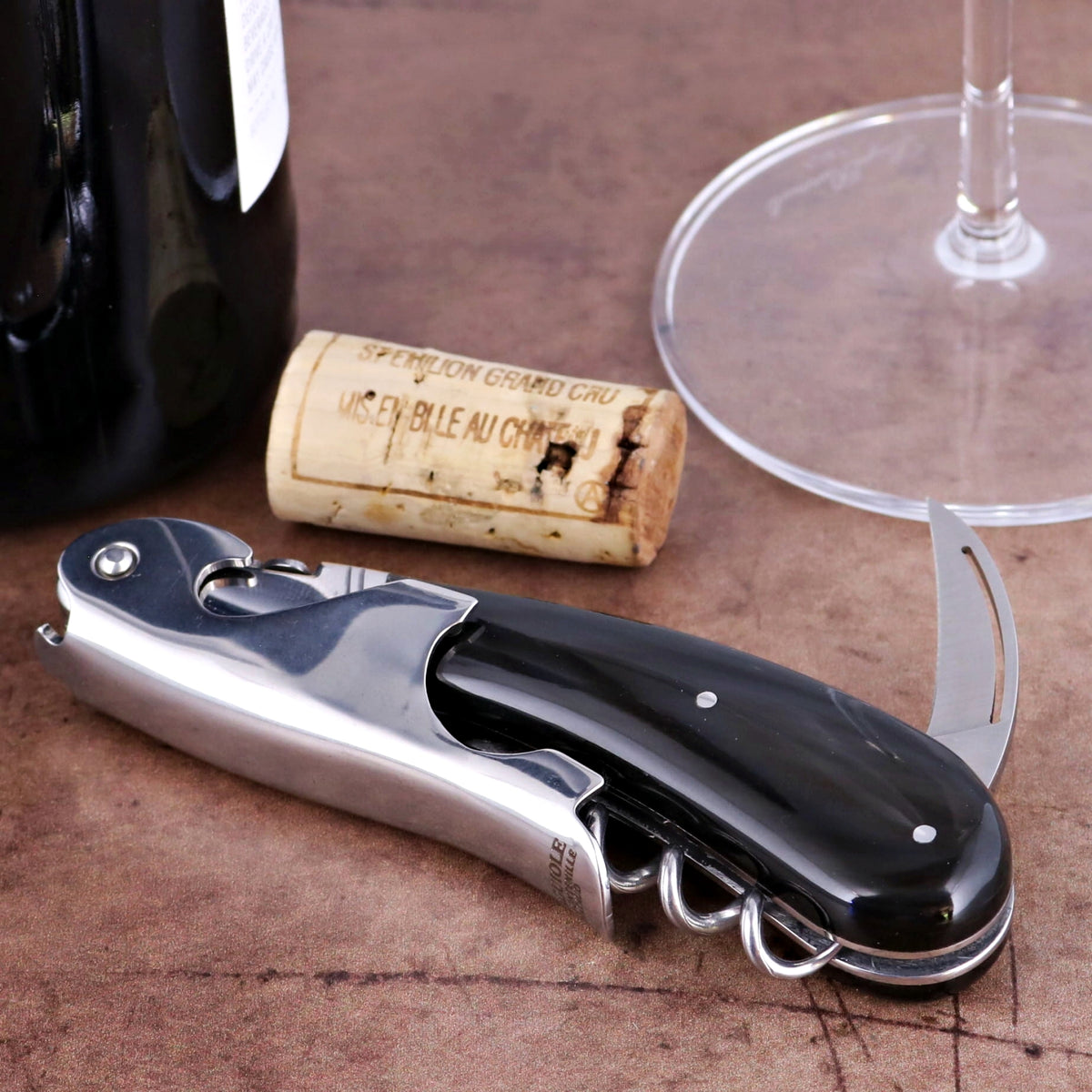 Laguiole Magnum Black Horn Tip Corkscrew, close-up of polished silver and black horn handle.