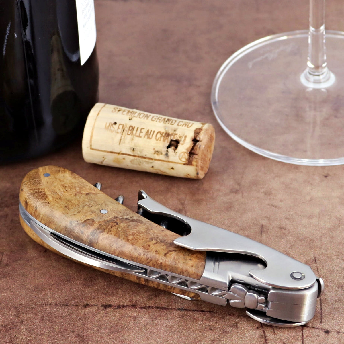 Laguiole Magnum Burled Teak Corkscrew, close-up of the elegant burled teak handle and stainless steel mechanism.