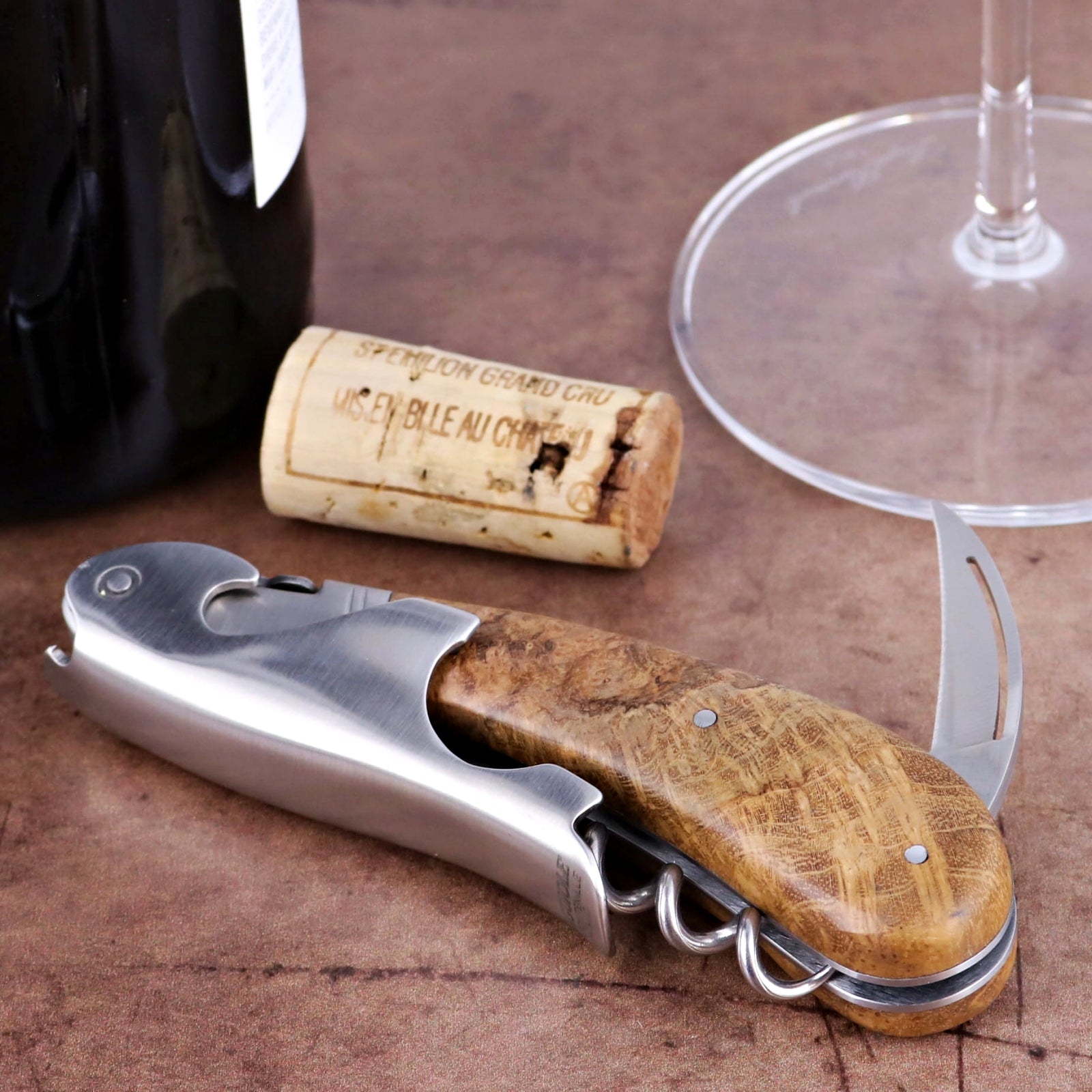 Laguiole Magnum Burled Teak Corkscrew - B, close-up side view of the burled teak handle and stainless steel body.