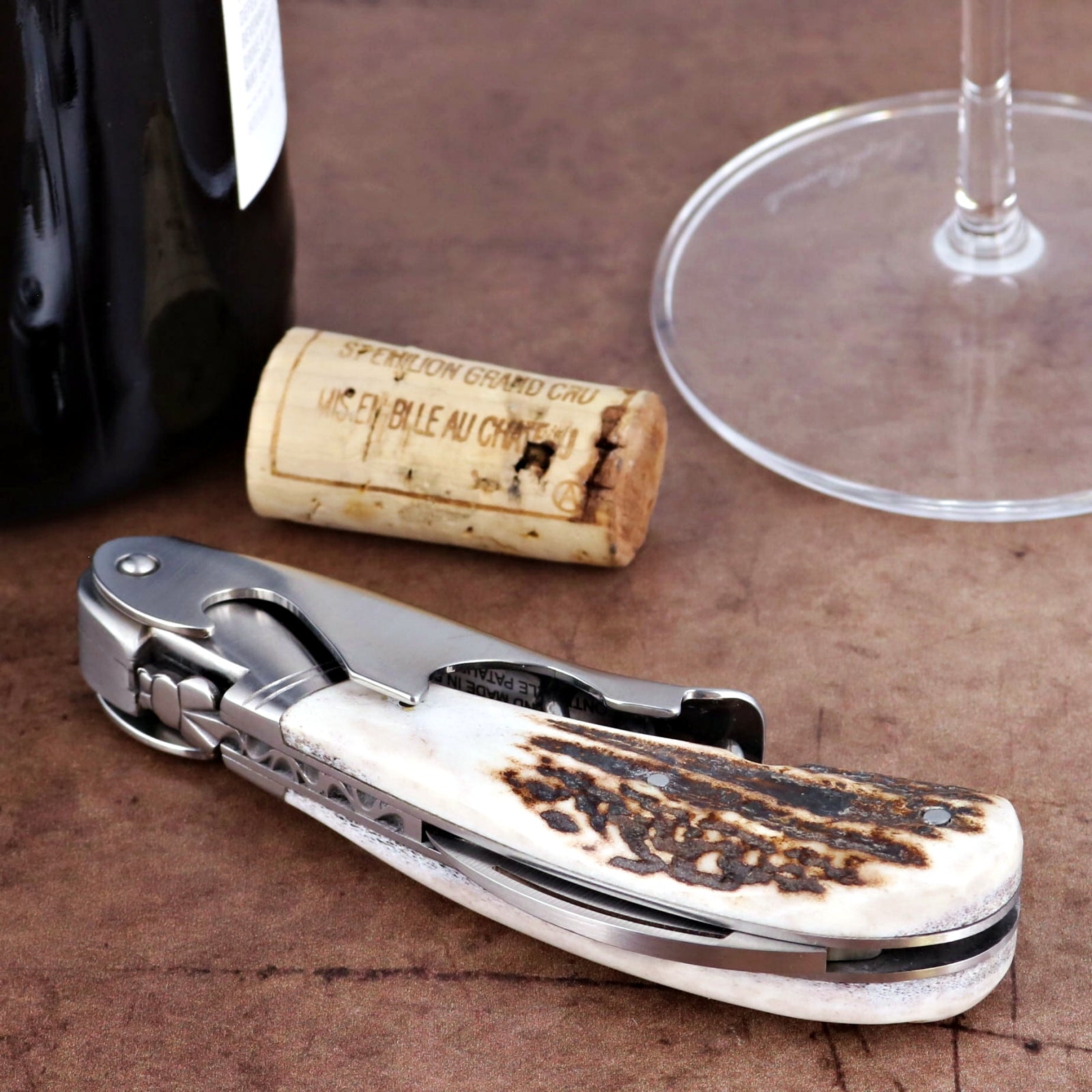 Laguiole Magnum Deer Stag Corkscrew - D, close-up of the stag horn handle and stainless steel tools.