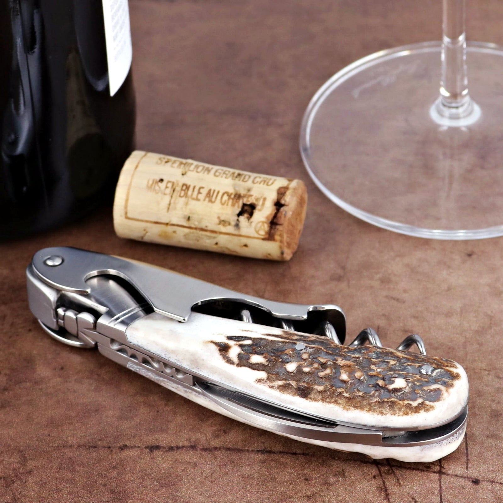 Laguiole Magnum Deer Stag Corkscrew, close-up of natural stag handle and polished stainless steel.