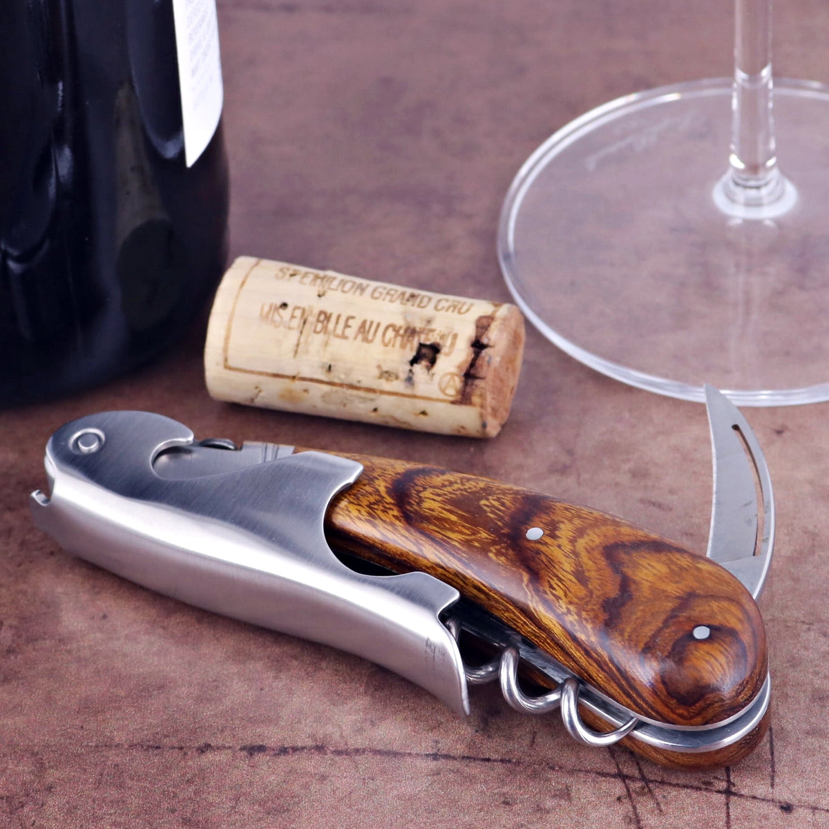 Laguiole Magnum Desert Ironwood Corkscrew, close-up of the wood handle and stainless steel body.
