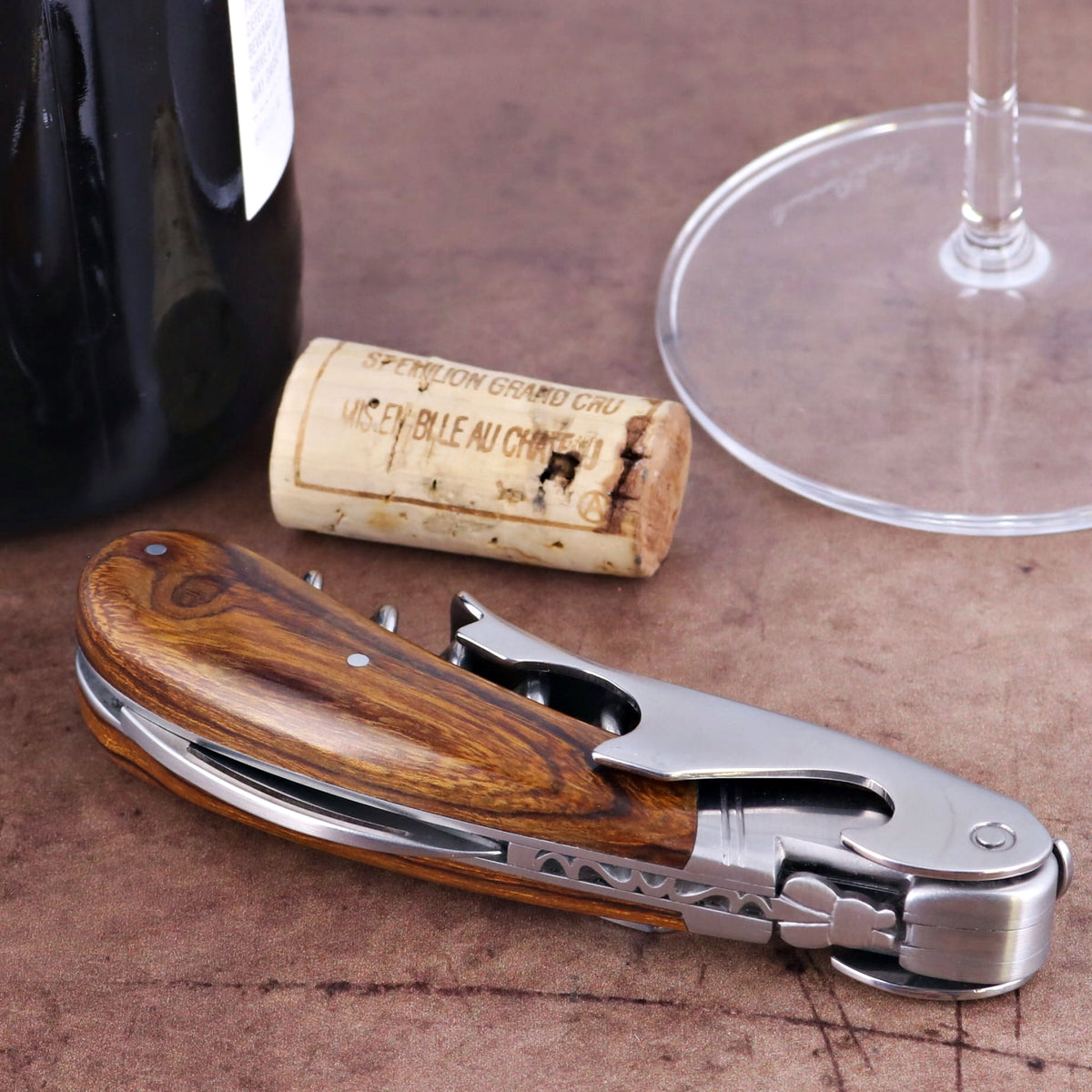 Laguiole Magnum Desert Ironwood Corkscrew, close-up of the elegant wood handle and stainless steel body.