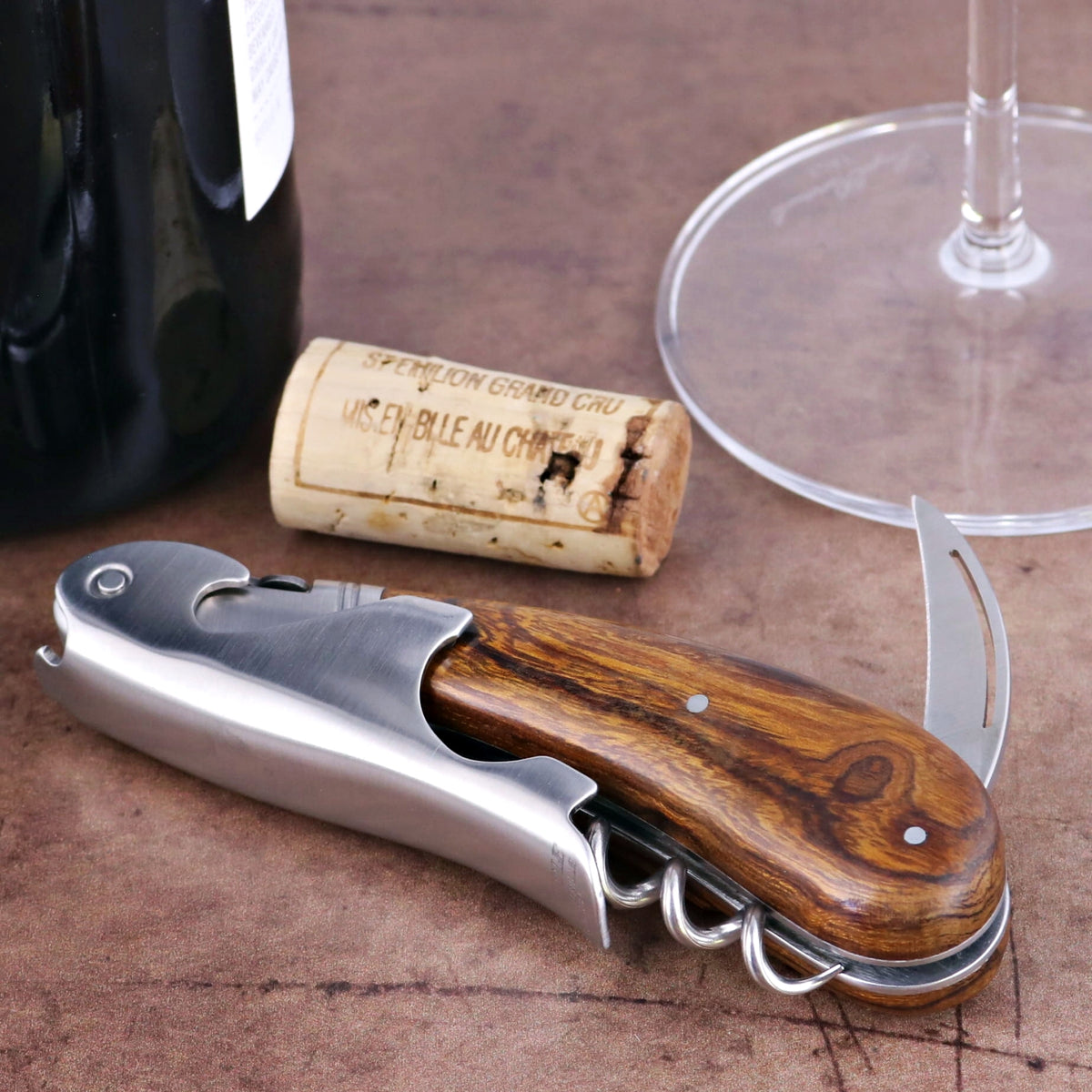 Laguiole Magnum Desert Ironwood Corkscrew, close-up of the polished wood handle and stainless steel tools.