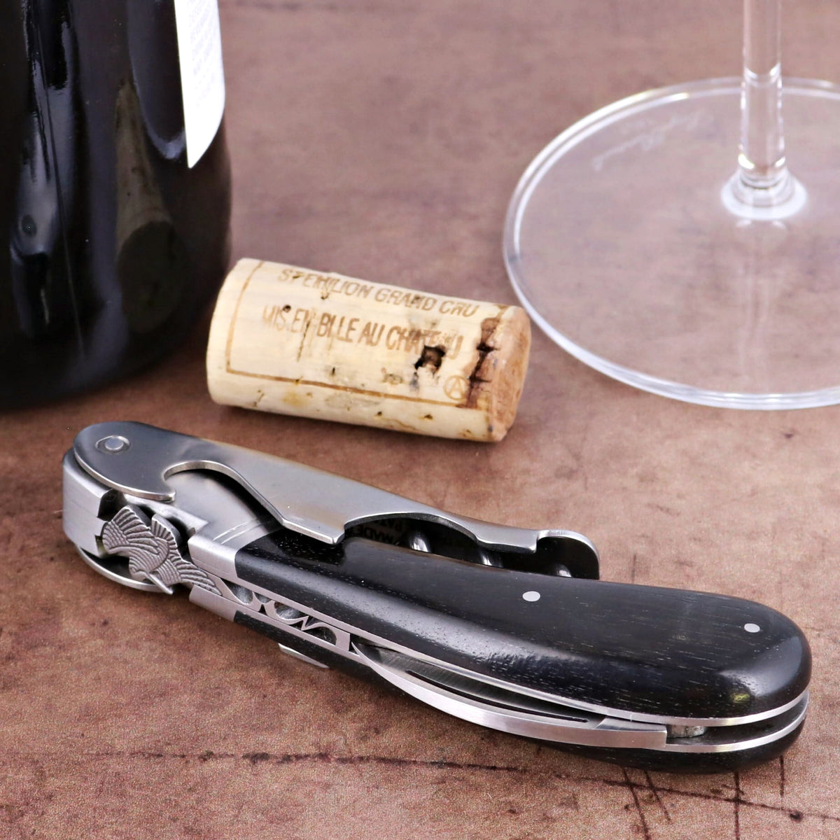 Laguiole Magnum Ebony Corkscrew, close-up of black ebony handle and polished steel mechanism.