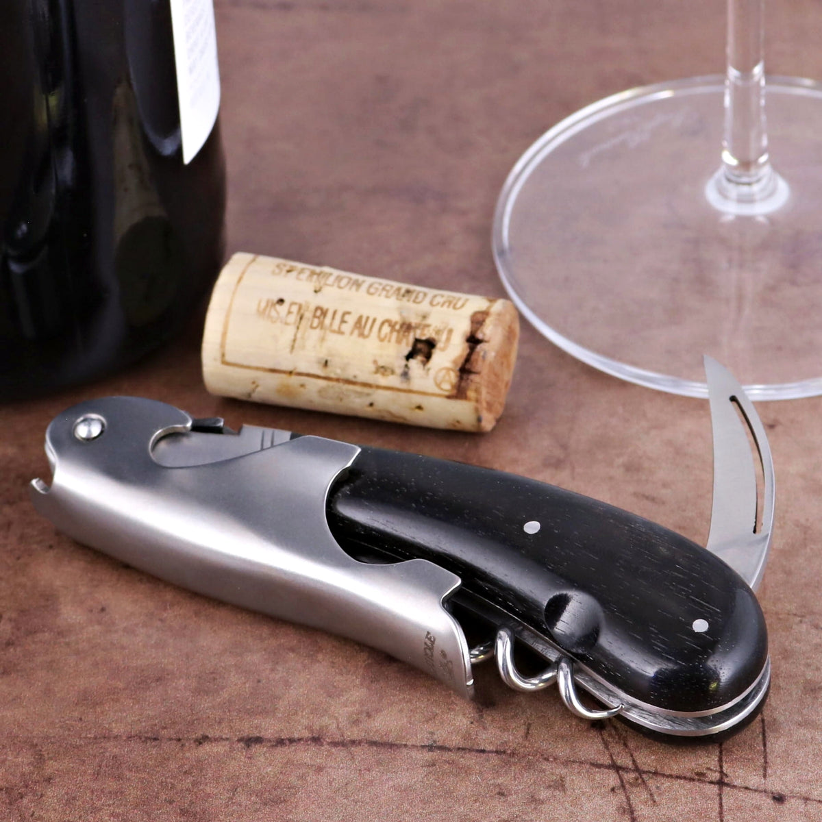 Laguiole Magnum Ebony Corkscrew, close-up of the black ebony handle and stainless steel body.