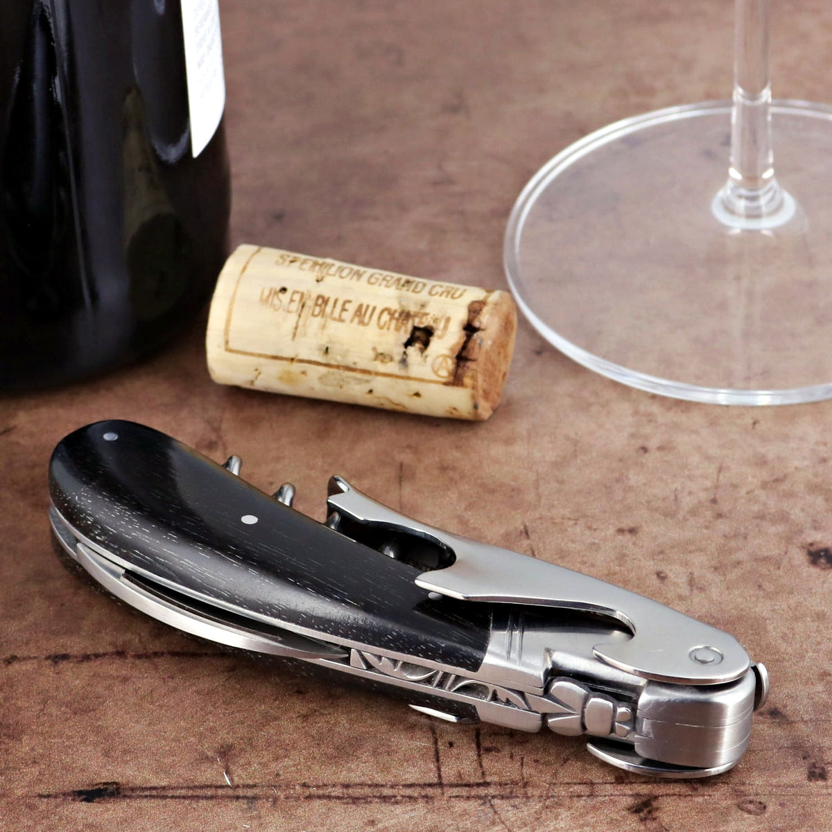 Laguiole Magnum Ebony Corkscrew, close-up of folded black ebony handle and stainless steel body.