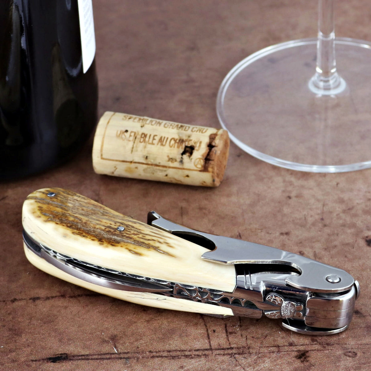Laguiole Magnum Guilloche Corkscrew, side view of fossilized mammoth ivory handle.