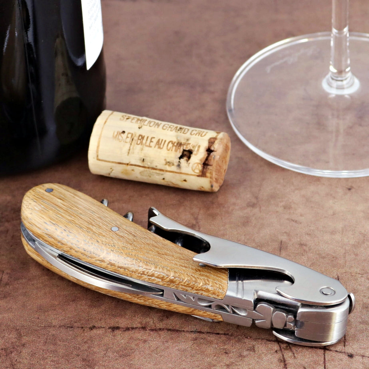 Laguiole Magnum Oak Barrel Wood Corkscrew, side view, showing wood handle and stainless steel tools.