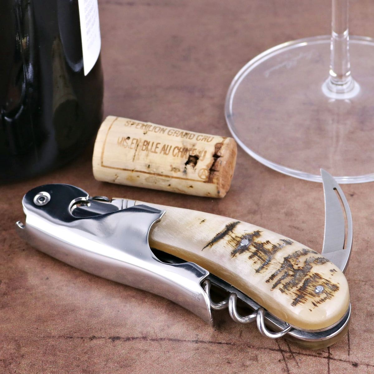Laguiole Magnum Ram Horn Corkscrew, close-up of polished steel and natural horn handle.