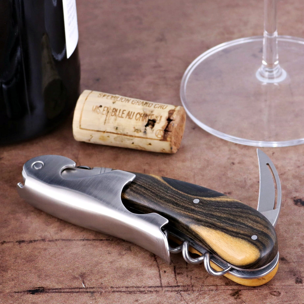 Laguiole Magnum Royal Ebony Corkscrew, close-up of ebony handle and brushed steel body.