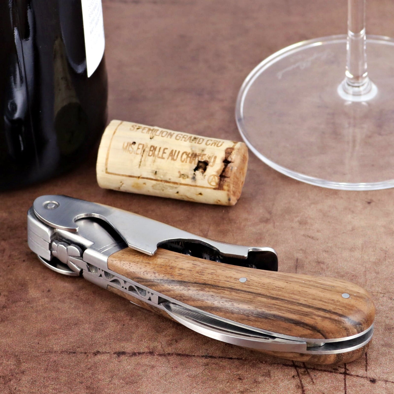 Laguiole Magnum Walnut Corkscrew - C, close-up of the elegant walnut handle and stainless steel body.