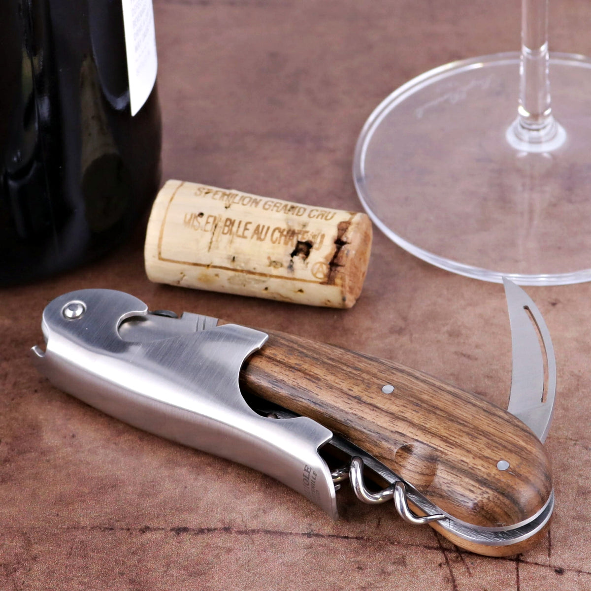 Laguiole Magnum Walnut Corkscrew - C, close-up of the elegant walnut handle and stainless steel body.