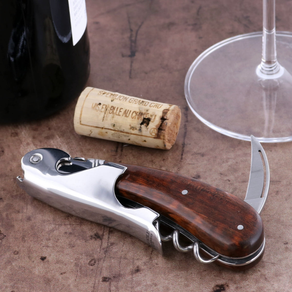 Laguiole Magnum Amourette Corkscrew, close-up of the polished stainless steel and dark wood handle.