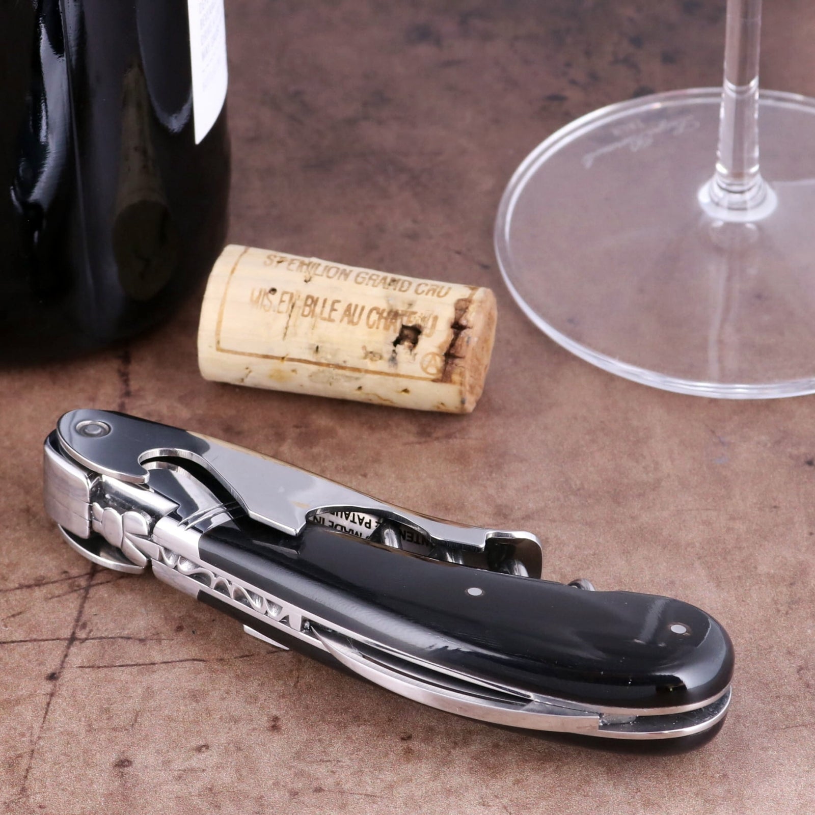 Laguiole Magnum Black Horn Tip Corkscrew, close-up of polished steel and black horn handle design.
