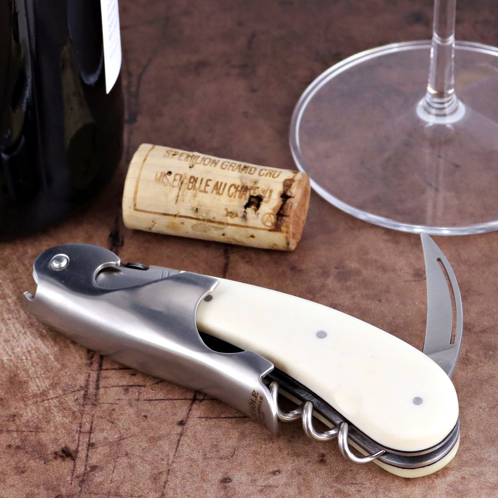 Laguiole Magnum Cattle Bone Handle Corkscrew, close-up of white bone handle and stainless steel tool.