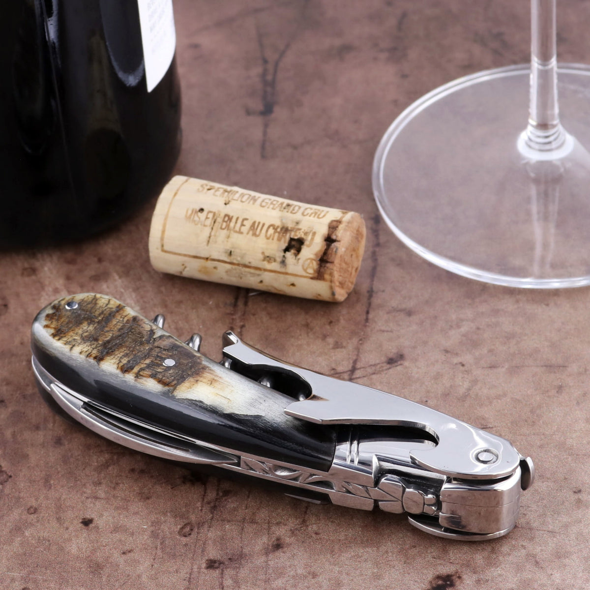 Laguiole Magnum Dark Ram Horn Corkscrew, close-up of dark horn handle with stainless steel accents.
