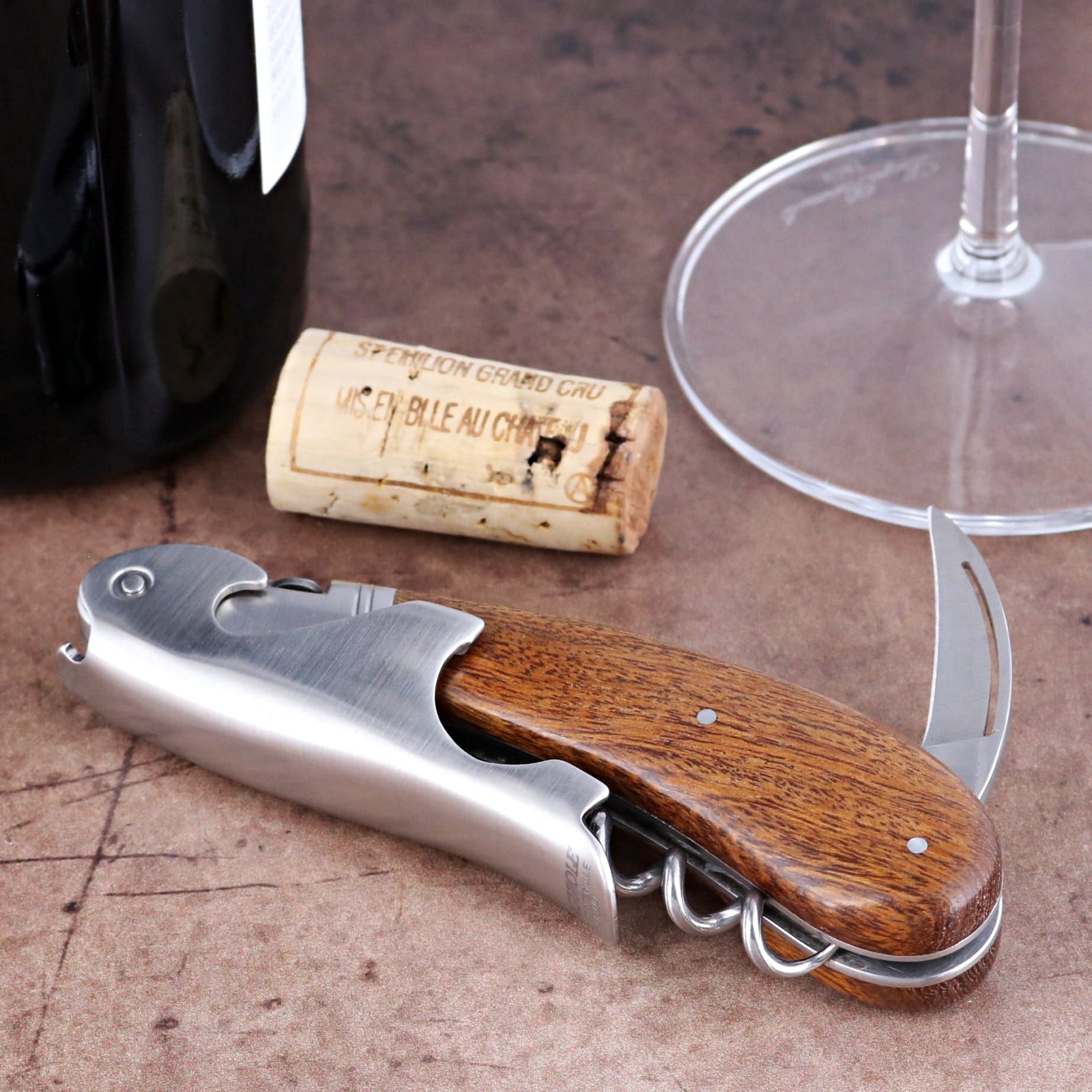Laguiole Magnum Desert Ironwood Corkscrew, close-up side view showing wood handle and steel foil cutter.
