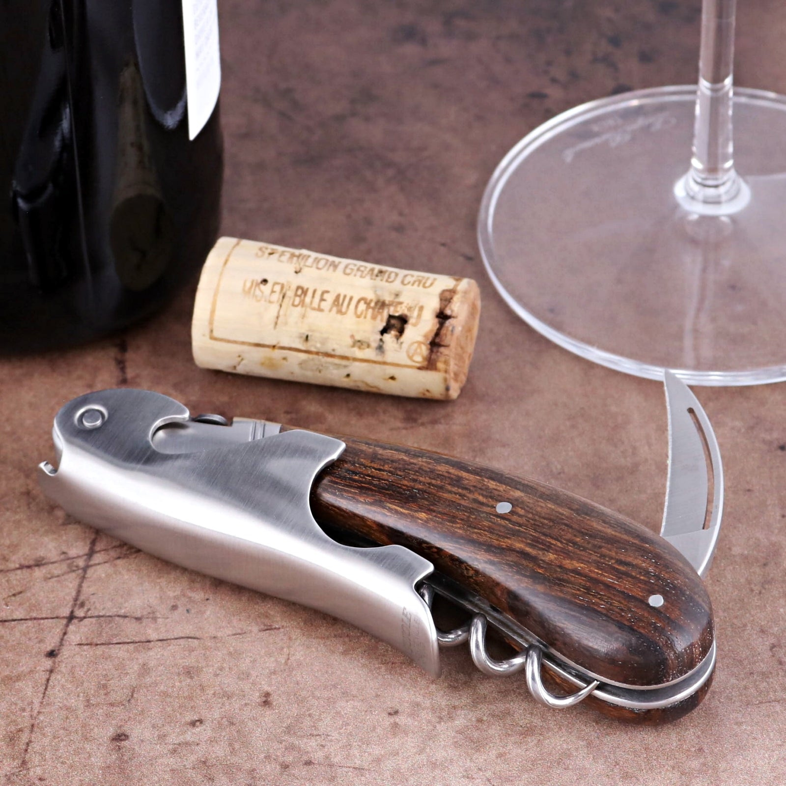Laguiole Magnum Desert Ironwood Corkscrew close-up with dark wood handle and polished steel bolster.