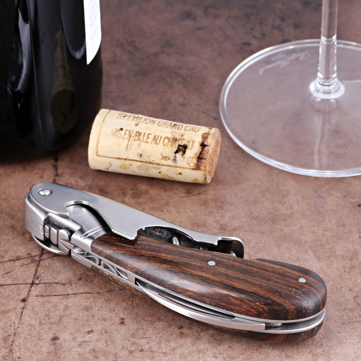 Laguiole Magnum Desert Ironwood Corkscrew close-up featuring a polished steel and wood handle design.