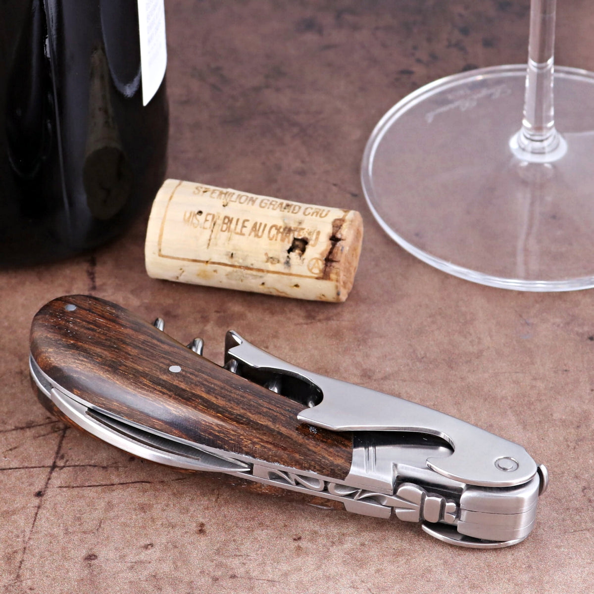 Laguiole Magnum Desert Ironwood Corkscrew, close-up side view of polished steel and wood handle.
