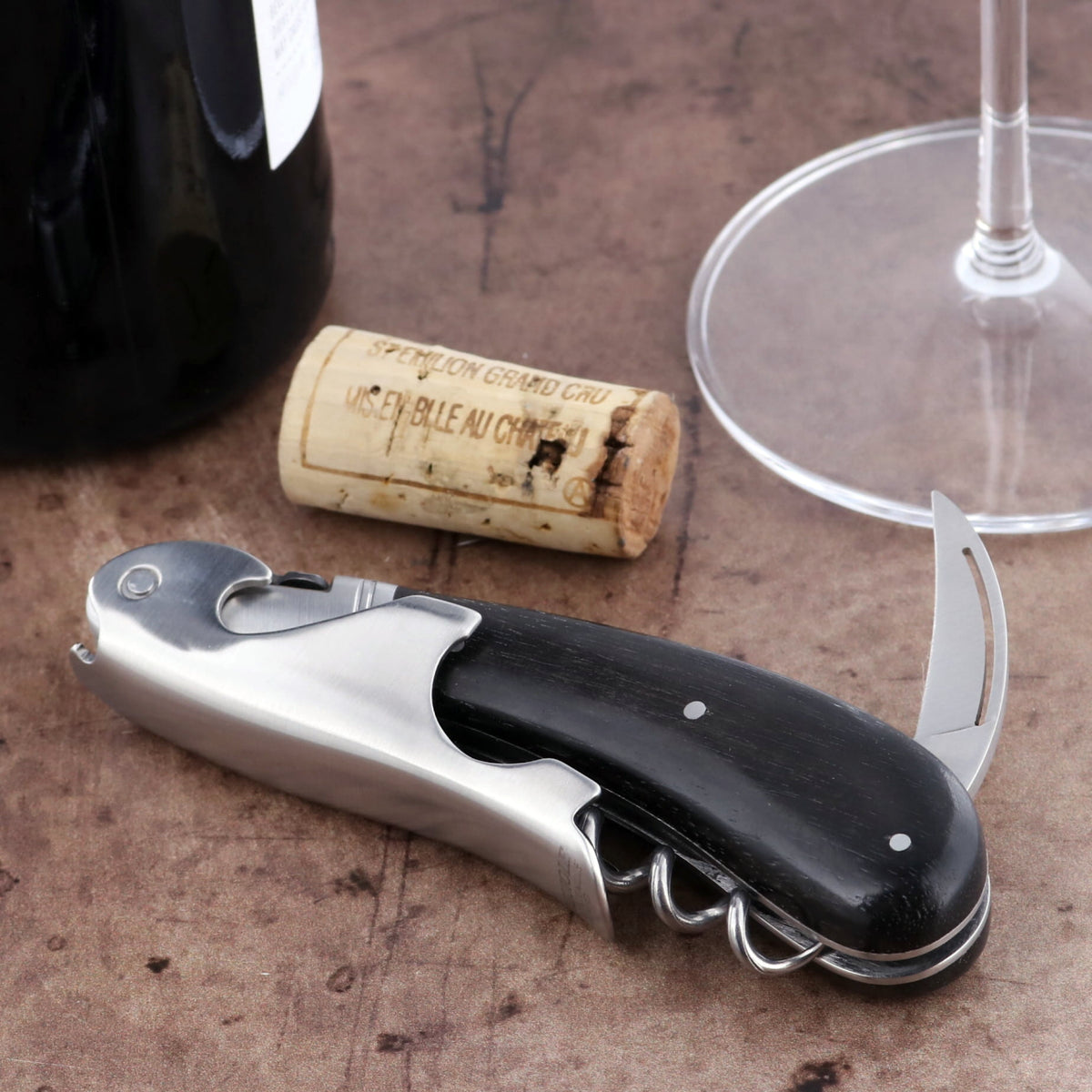 Laguiole Magnum Ebony Corkscrew, close-up of black ebony handle, stainless steel, and worm.