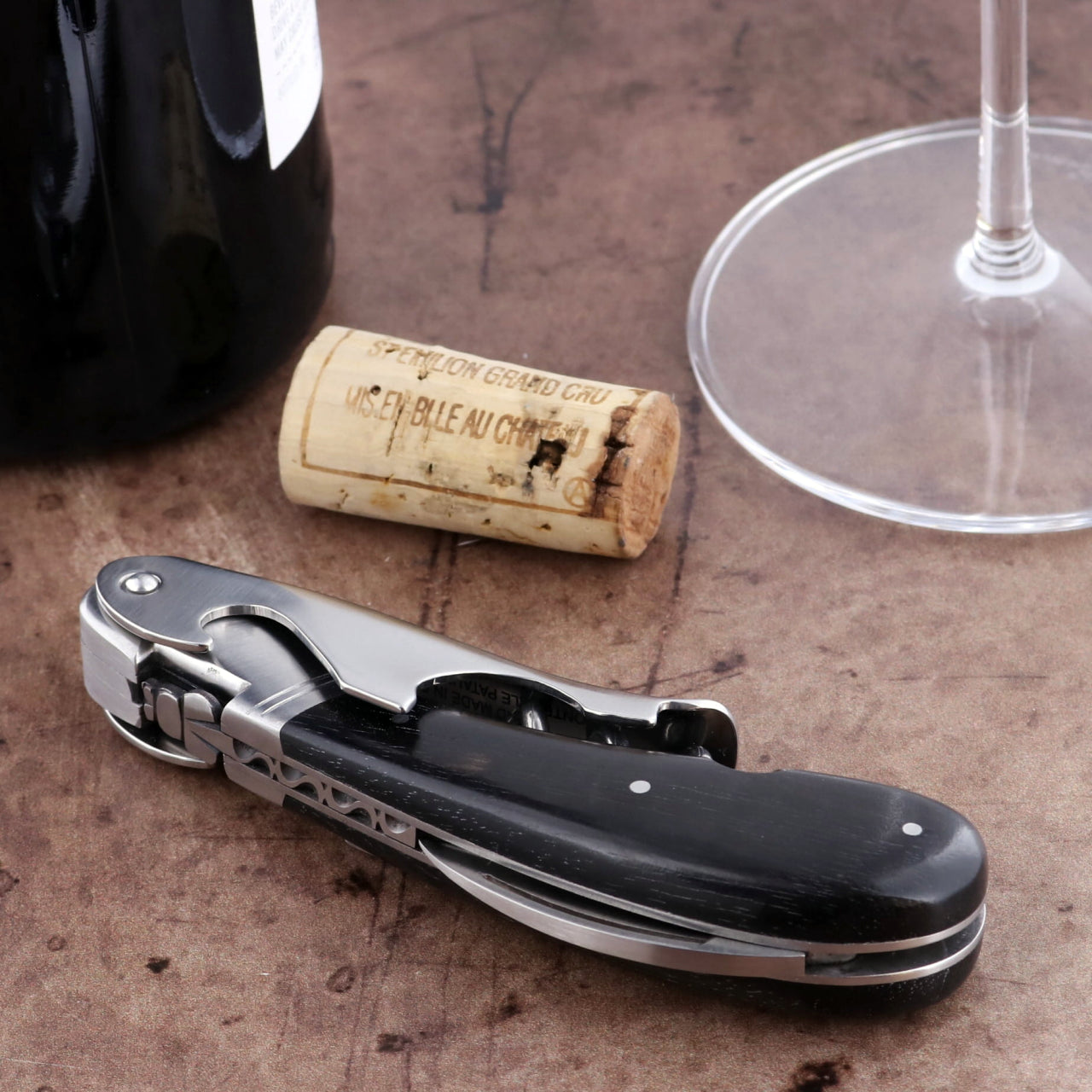 Laguiole Magnum Ebony Corkscrew, close-up of black ebony handle, stainless steel, and worm.