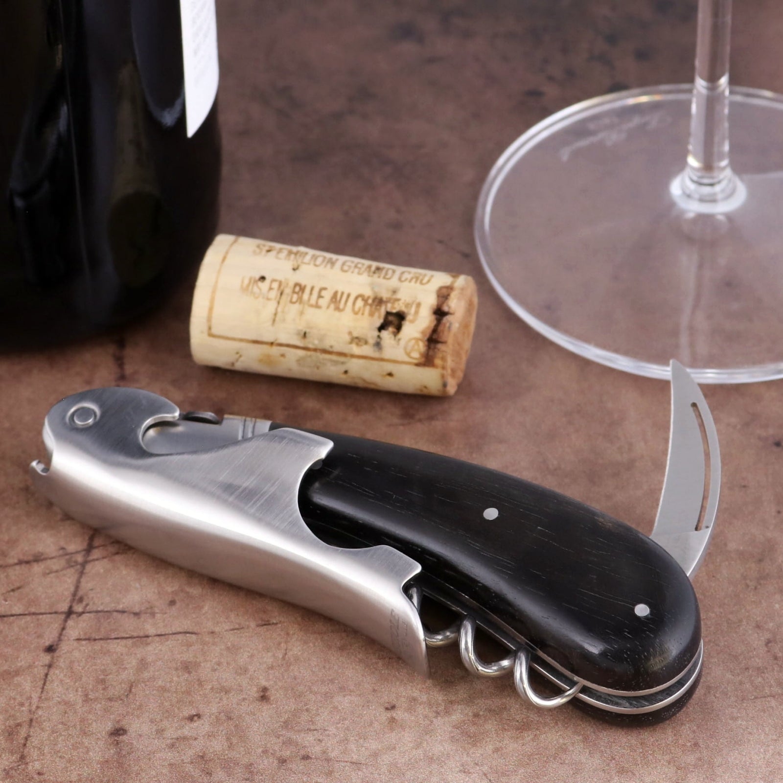 Laguiole Magnum Ebony Corkscrew, high-angle view featuring a polished steel bolster and black wood handle.