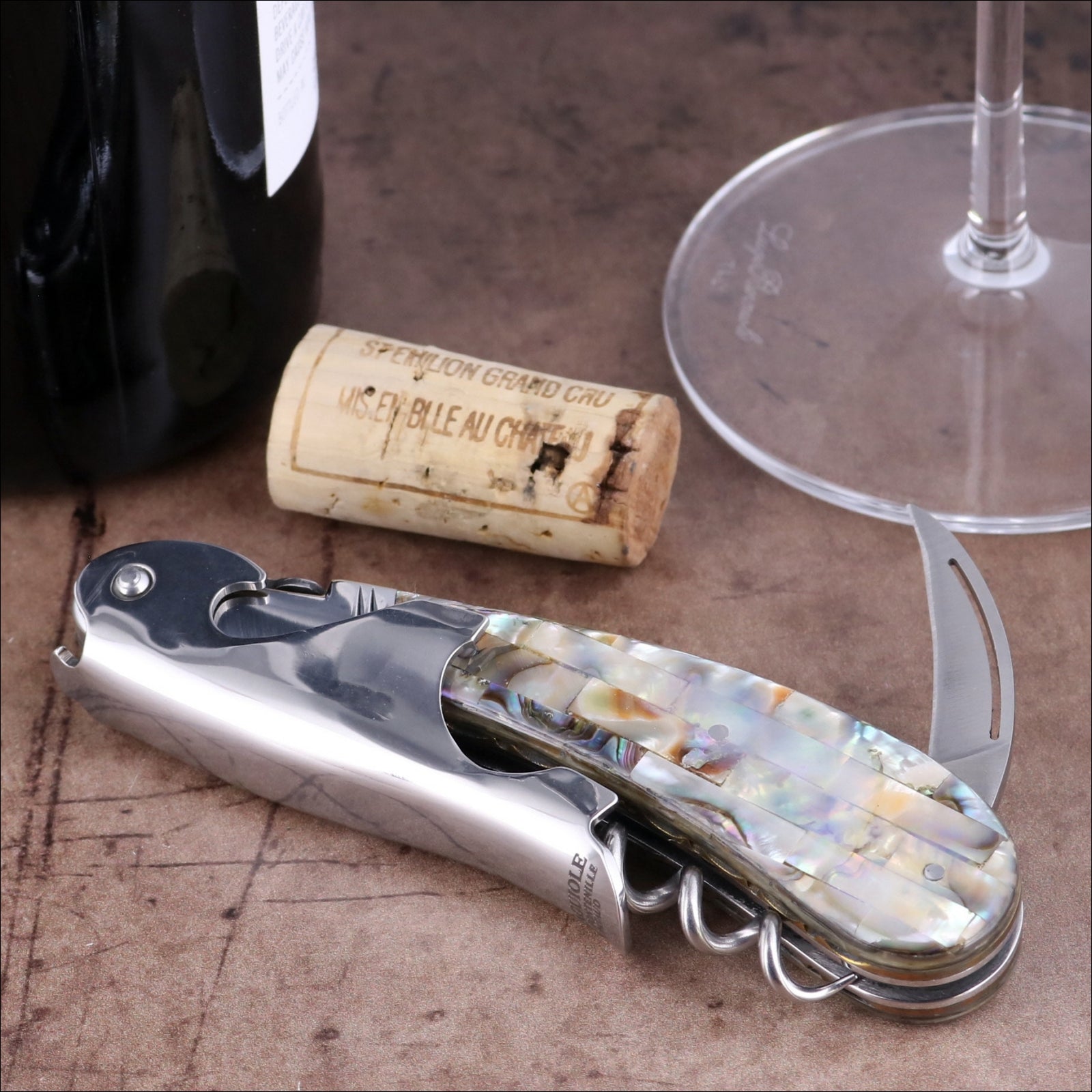 Laguiole Magnum Mother of Pearl Corkscrew, close-up of iridescent handle and polished steel finish.