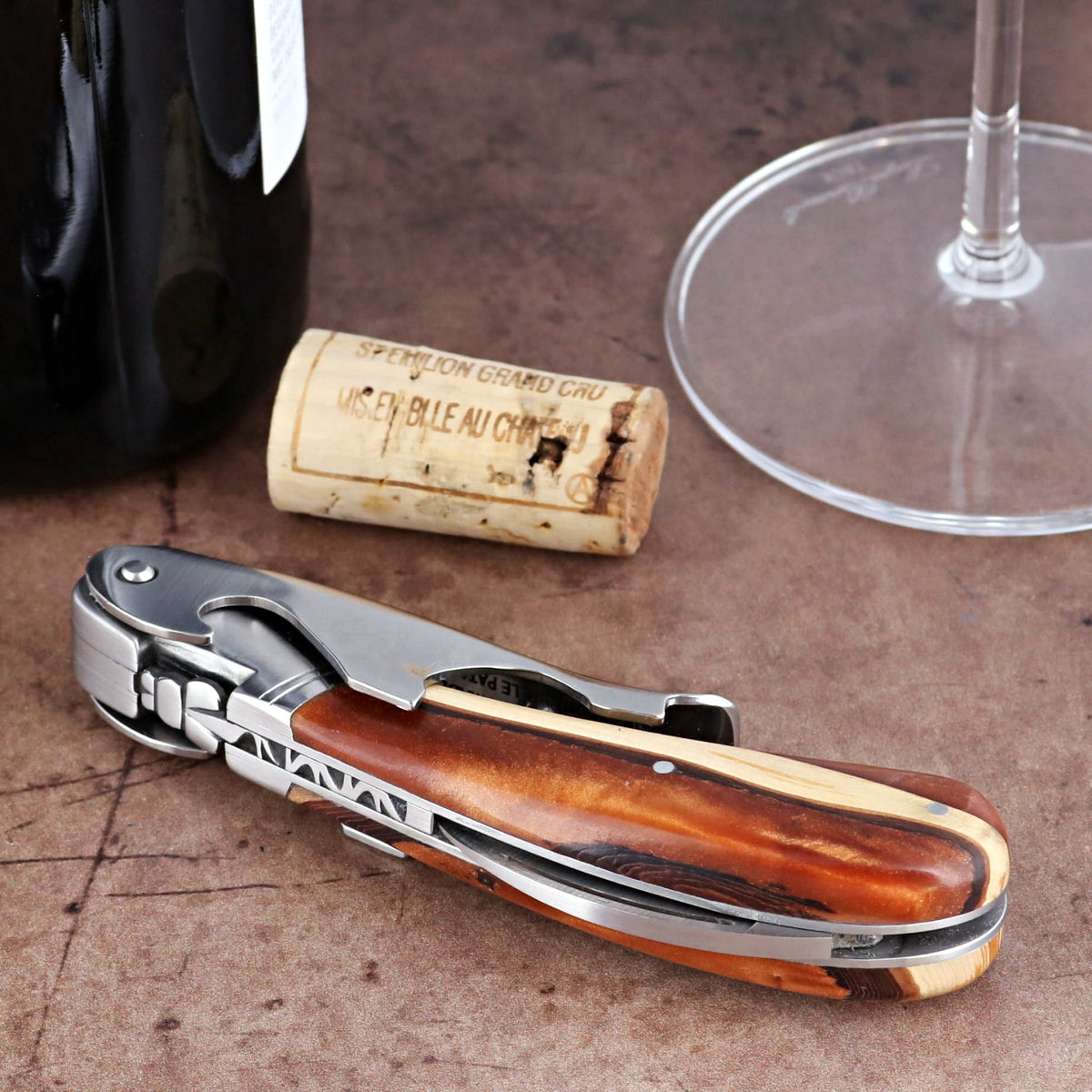 Laguiole Magnum Hybrid Juniper Burl Corkscrew, close-up of the polished steel and wood handle design.