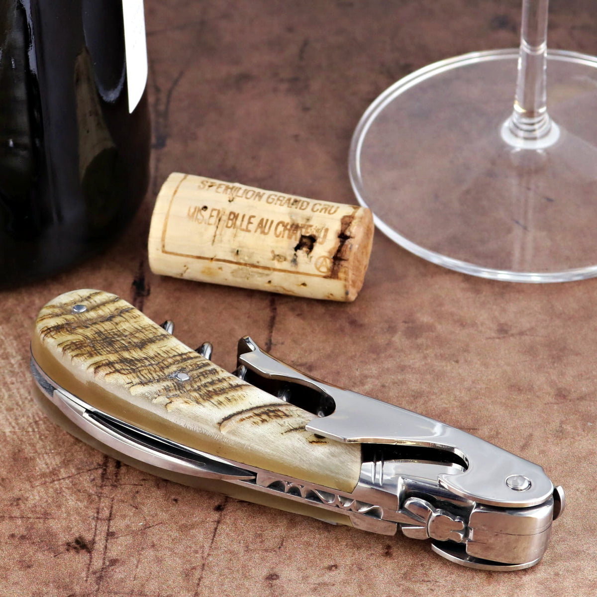 Laguiole Magnum Ram Horn Corkscrew, close-up of the polished steel and textured horn handle design.