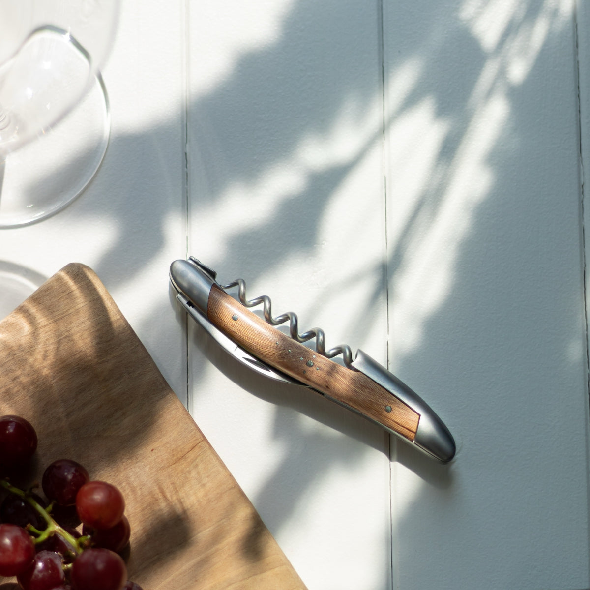 Forge de Laguiole Corkscrew, top-down view of satin finish steel and natural vine wood handle.
