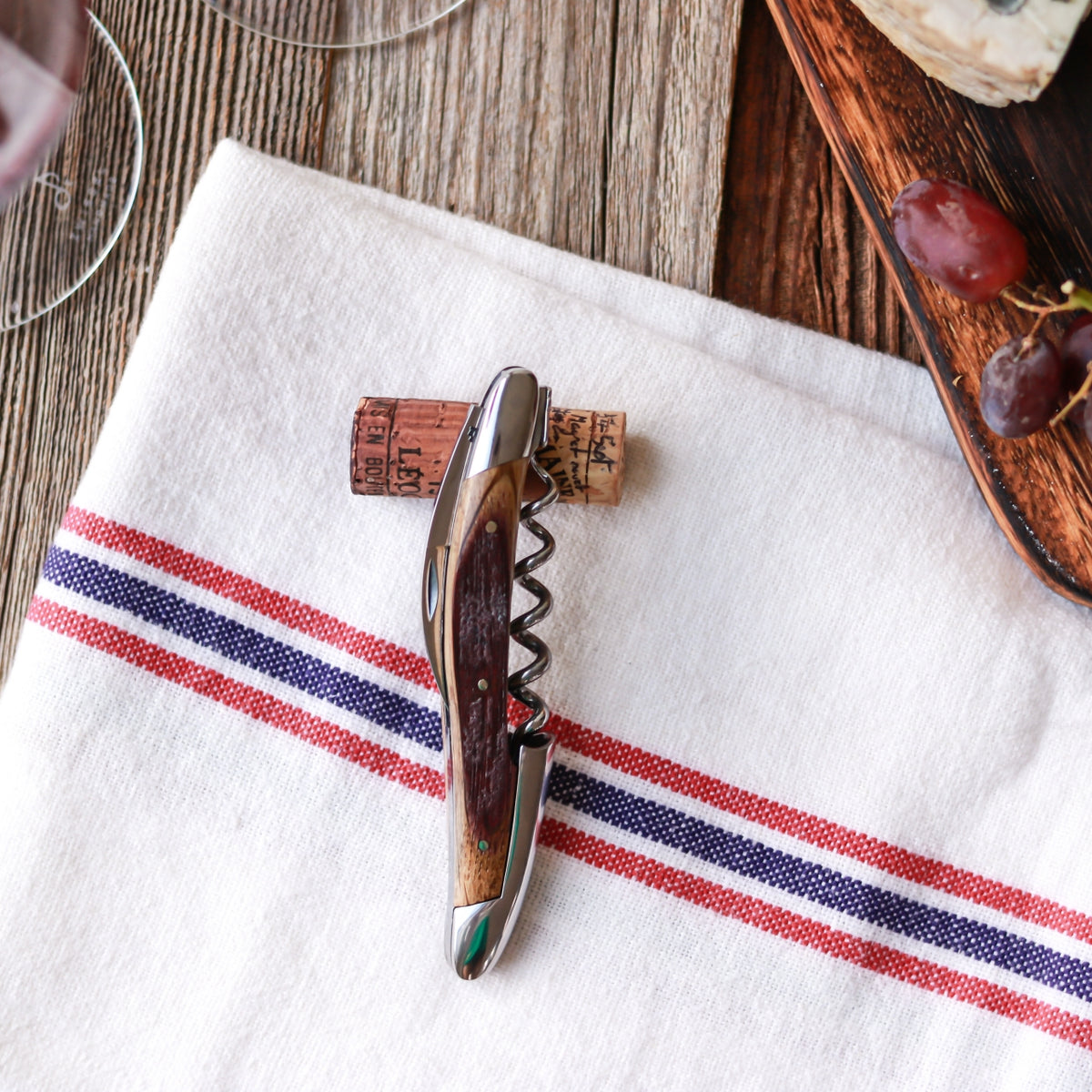 Forge de Laguiole Corkscrew, top-down view of oak barrel wood handle with shiny steel accents.