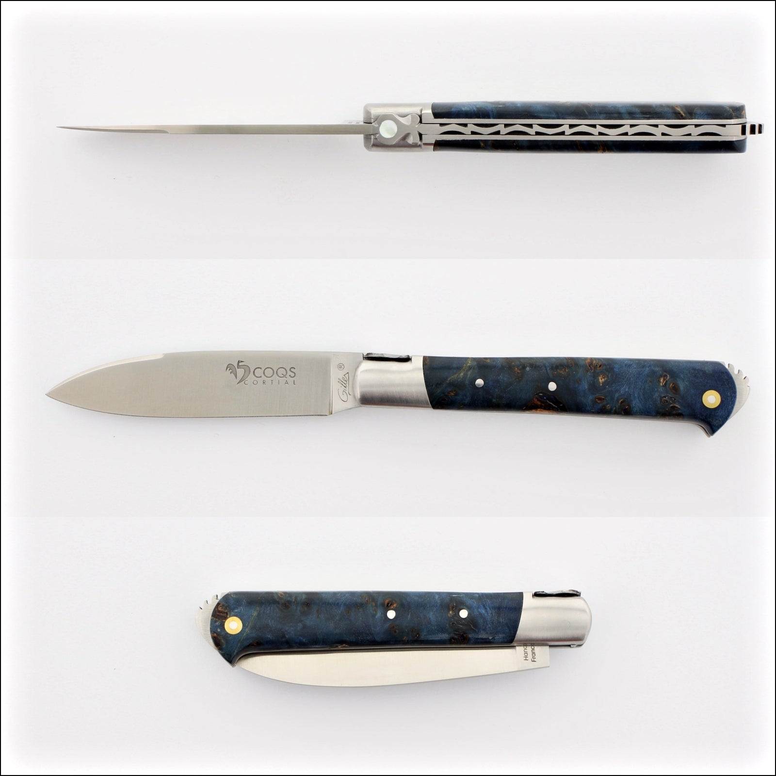 5 Coqs Pocket Knife, top-down and side views, blue stabilized poplar burl & mother of pearl inlay. Handcrafted details, 100% Made in France.