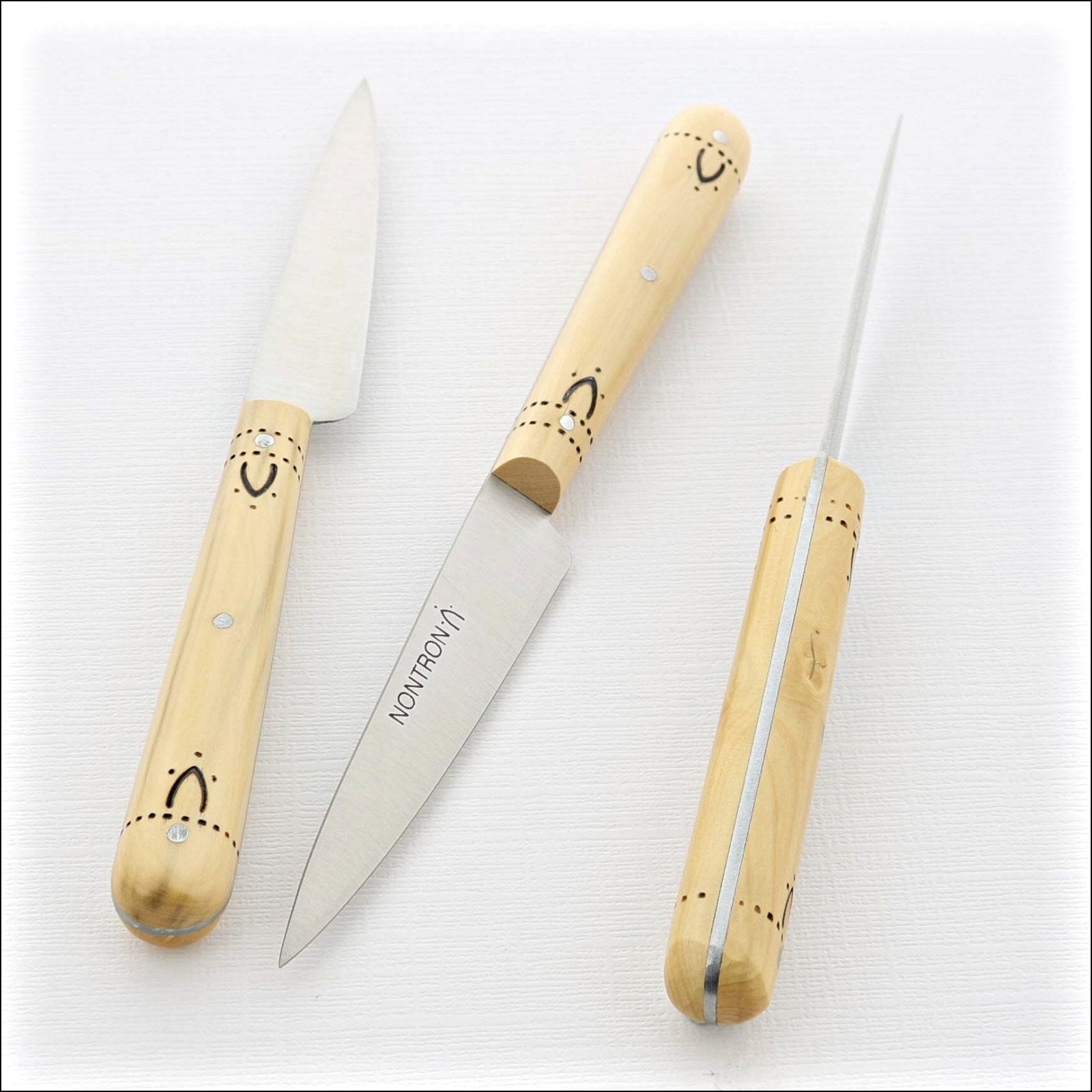 https://www.laguiole-imports.com/cdn/shop/products/Nontron-Paring-Kitchen-Knife-Ndeg9-Boxwood-Handle-Nontron-France-2.jpg?v=1633084238